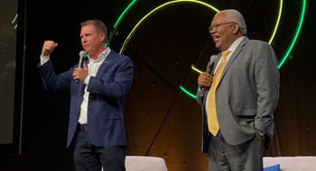 Sandals Resorts International executive chairman Adam Stewart, left, and Gary Sadler, executive vice president of sales and industry relations at Unique Vacations, at CruiseWorld.