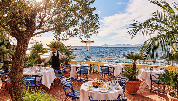 Breakfast on the terrace at Hotel Belles Rives in neighboring Juan-les-Pins.