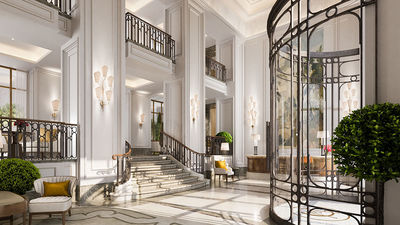 The lobby of the Corinthia Rome. The property combines century-old features from the building's days as a bank with contemporary touches.