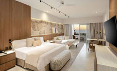 Renovated suites feature a palette of sand, beige, cream and warm wood tones.