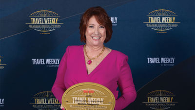 Michele Saegesser with her Lifetime Achievement Award at the 2024 Travel Weekly Readers Choice Awards.