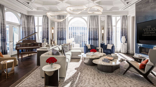 The refreshed living room of the Colosseum Presidential Villas at Caesars Palace features custom chandeliers crafted from metal, glass and crystal.